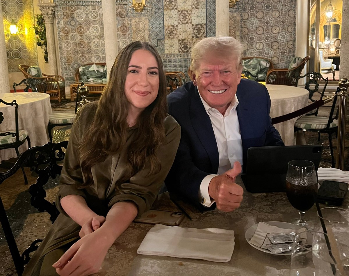 Chaya Raichik, creator behind the X account Libs of TikTok poses with Donald Trump.