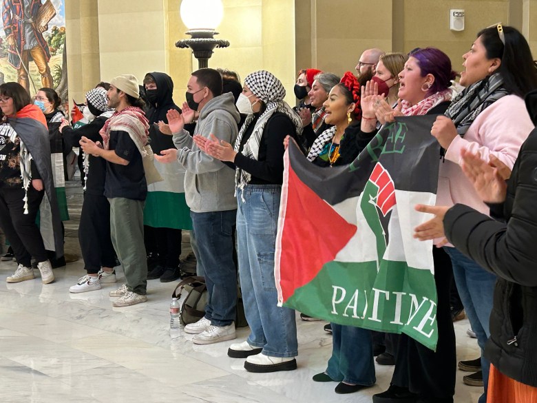 Protesters congregate before Stitt's State of the State Address.