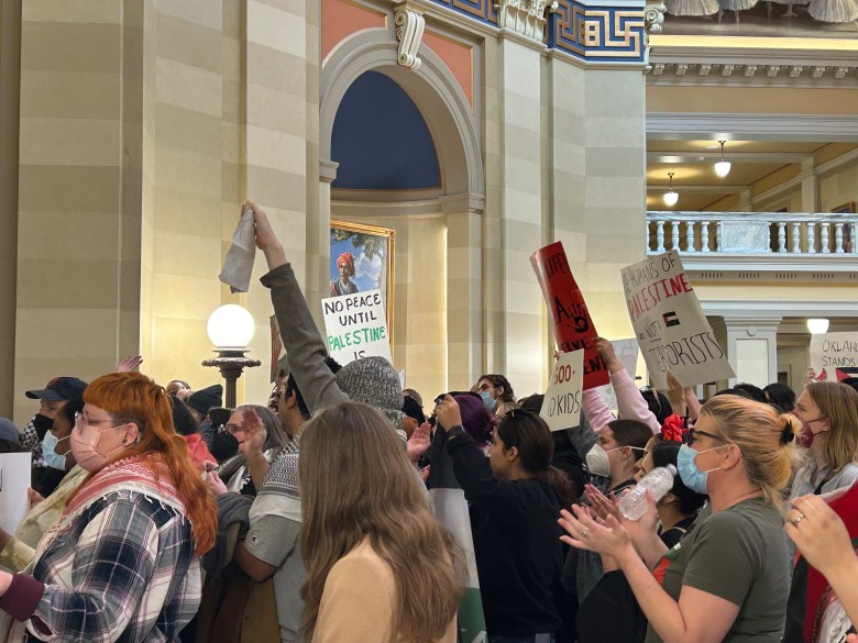 Protesters gathered outside the House floor.