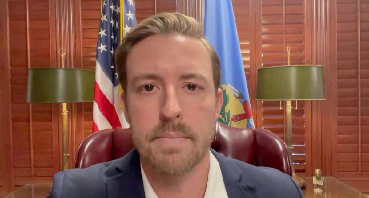 Ryan Walters in a video he posted to X on Feb. 26, 2024. He is sitting at his desk, behind him is both the American and Oklahoma flags. The video was posted two days before the list of groups calling for his removal from office was released.